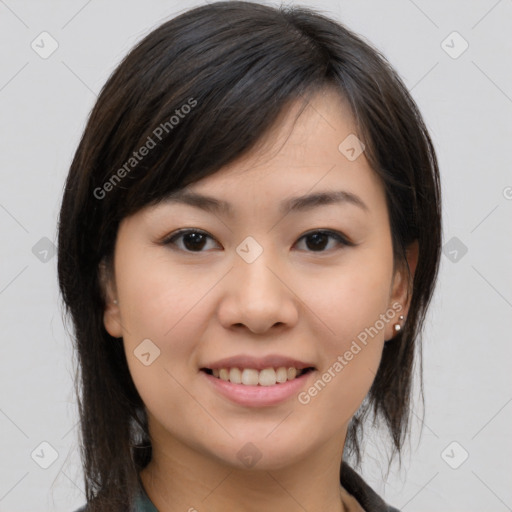 Joyful asian young-adult female with medium  brown hair and brown eyes