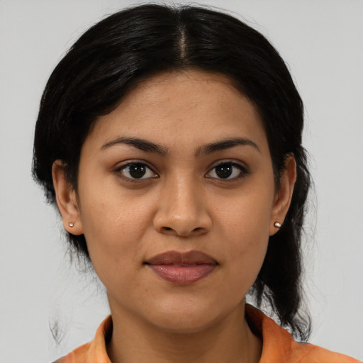 Joyful asian young-adult female with medium  black hair and brown eyes