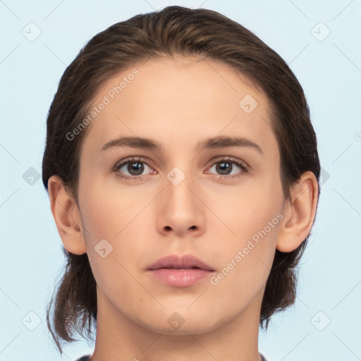 Neutral white young-adult female with medium  brown hair and brown eyes