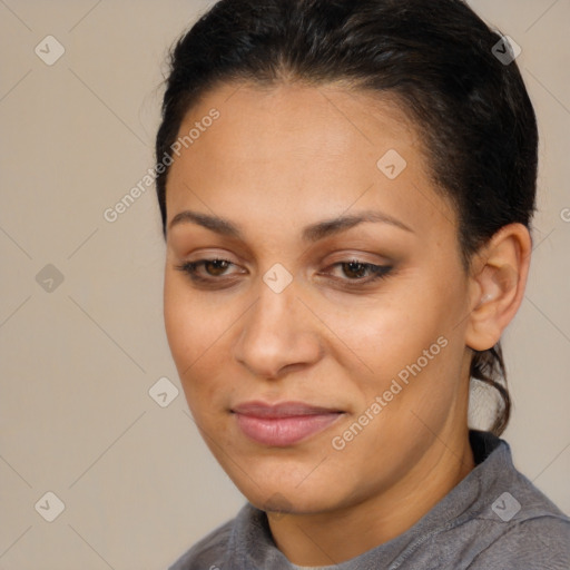 Joyful latino young-adult female with short  brown hair and brown eyes