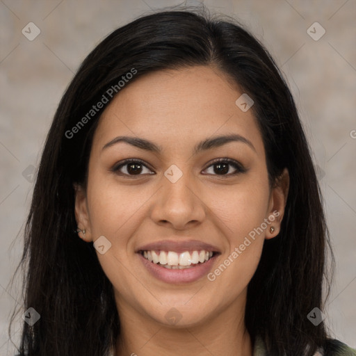 Joyful latino young-adult female with long  brown hair and brown eyes