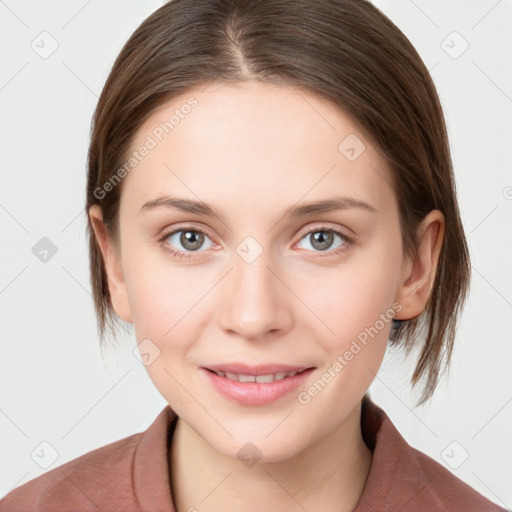 Joyful white young-adult female with medium  brown hair and blue eyes