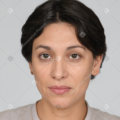 Joyful white adult female with medium  brown hair and grey eyes