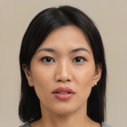 Neutral asian young-adult female with medium  black hair and brown eyes