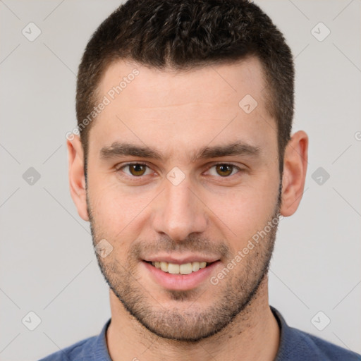 Joyful white young-adult male with short  brown hair and brown eyes