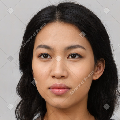 Neutral latino young-adult female with long  black hair and brown eyes