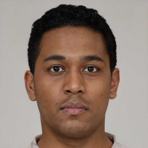 Neutral black young-adult male with short  brown hair and brown eyes