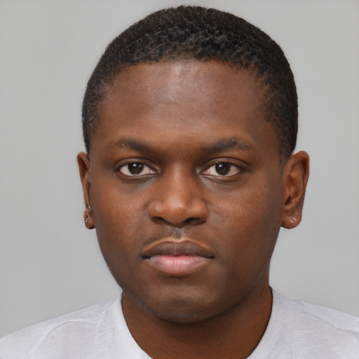Neutral black young-adult male with short  brown hair and brown eyes