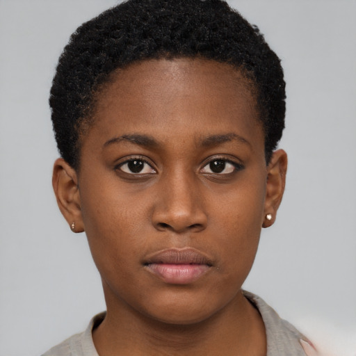 Neutral black young-adult female with short  brown hair and brown eyes