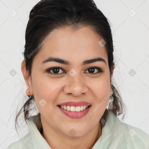 Joyful latino young-adult female with medium  brown hair and brown eyes