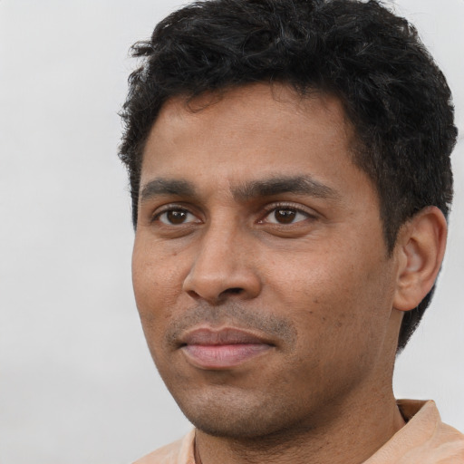 Neutral black young-adult male with short  brown hair and brown eyes