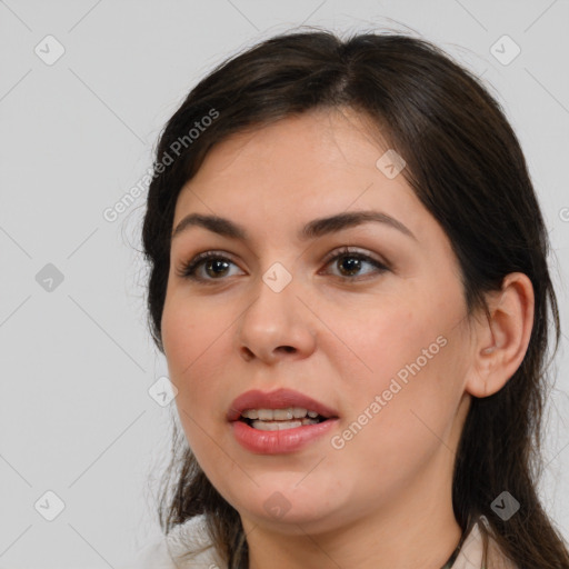 Joyful white young-adult female with medium  brown hair and brown eyes