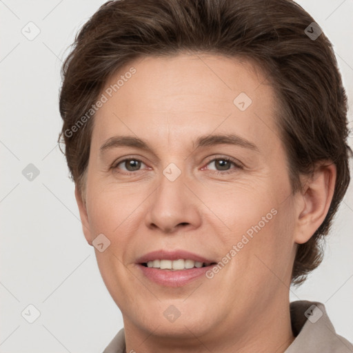 Joyful white adult female with short  brown hair and brown eyes