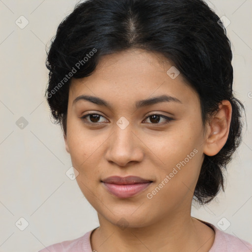 Joyful latino young-adult female with medium  brown hair and brown eyes