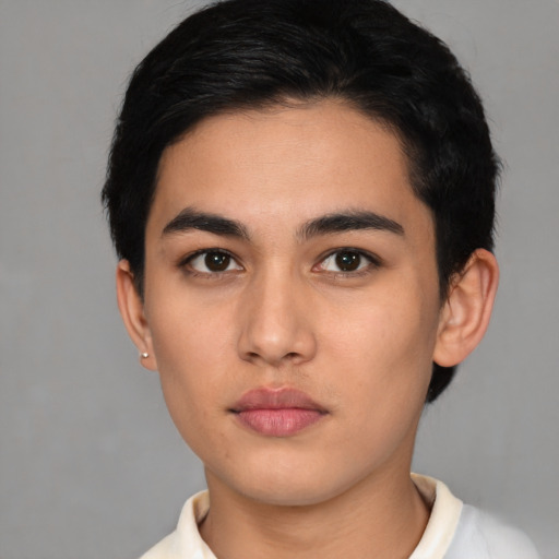 Neutral latino young-adult male with short  black hair and brown eyes