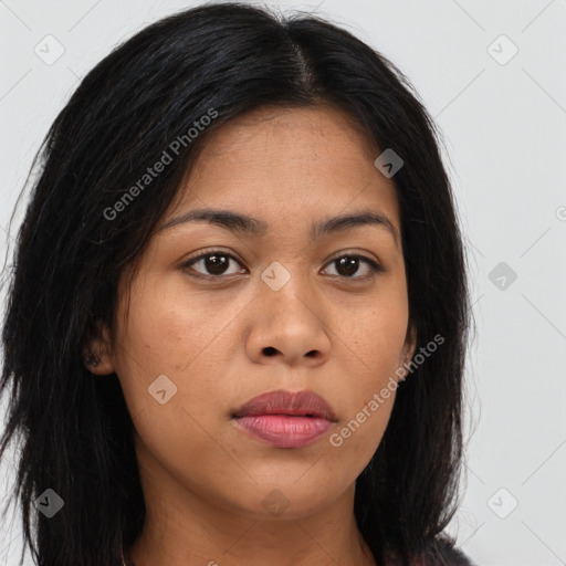 Joyful asian young-adult female with long  brown hair and brown eyes