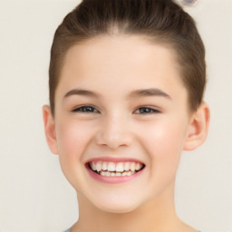 Joyful white child female with short  brown hair and brown eyes