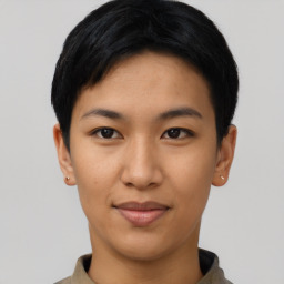 Joyful asian young-adult female with short  black hair and brown eyes