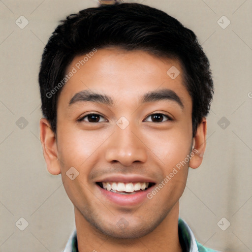 Joyful latino young-adult male with short  black hair and brown eyes