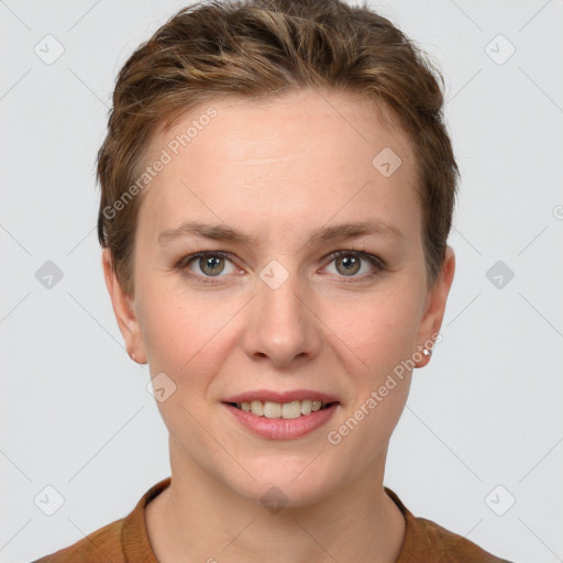 Joyful white young-adult female with short  brown hair and grey eyes