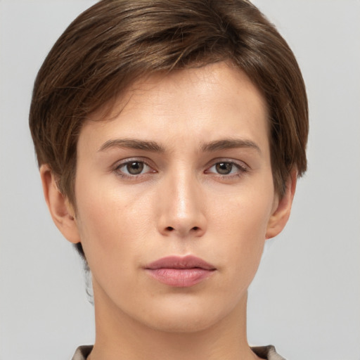 Neutral white young-adult female with short  brown hair and brown eyes