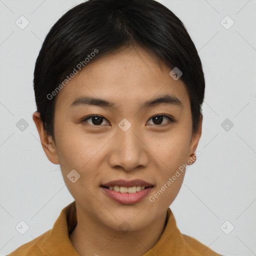 Joyful asian young-adult female with short  brown hair and brown eyes