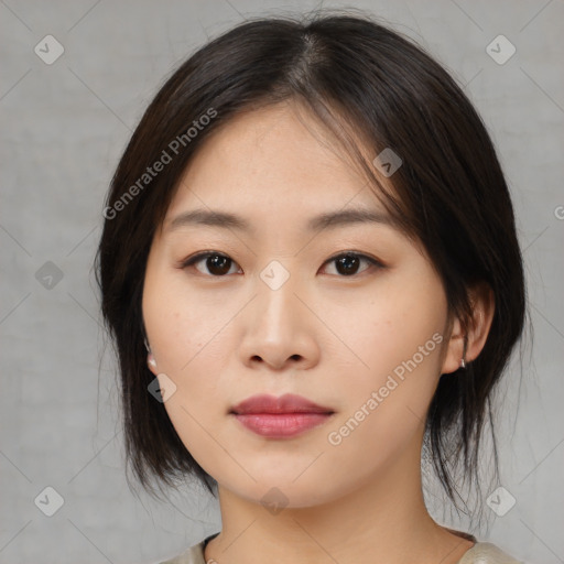 Neutral asian young-adult female with medium  brown hair and brown eyes