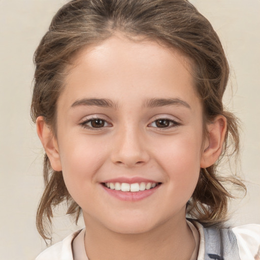 Joyful white child female with medium  brown hair and brown eyes