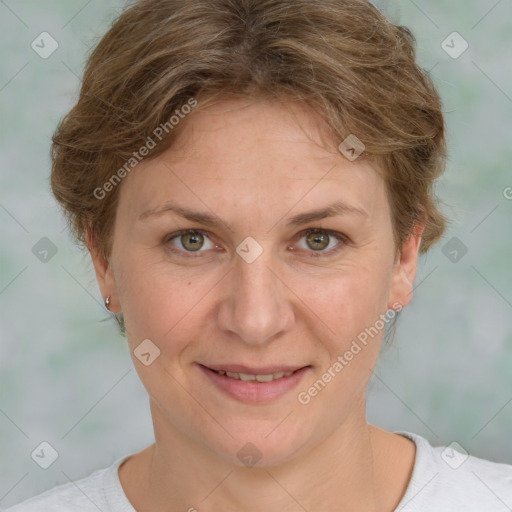 Joyful white adult female with short  brown hair and grey eyes