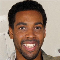 Joyful black young-adult male with short  black hair and brown eyes