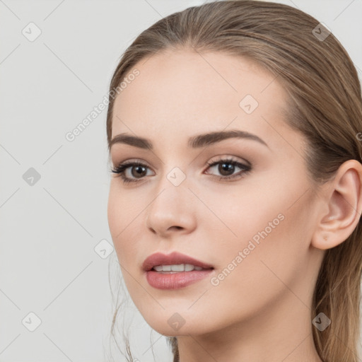 Neutral white young-adult female with long  brown hair and brown eyes