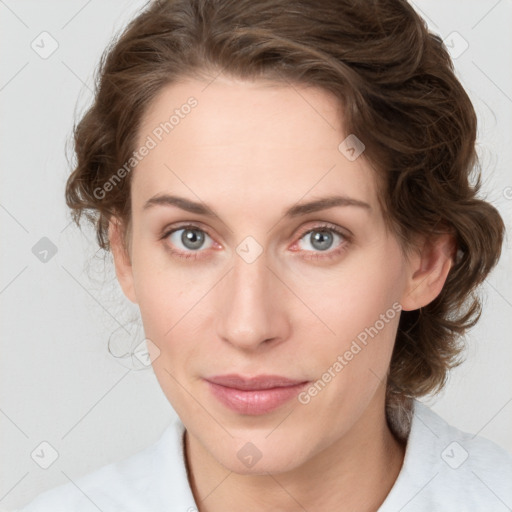 Joyful white young-adult female with medium  brown hair and green eyes