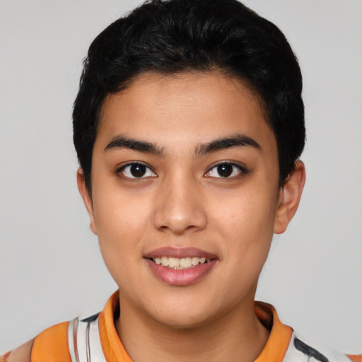 Joyful asian young-adult female with short  black hair and brown eyes