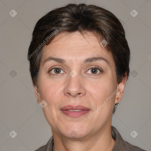 Joyful white adult female with short  brown hair and brown eyes