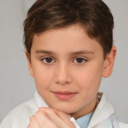 Joyful white child female with short  brown hair and brown eyes