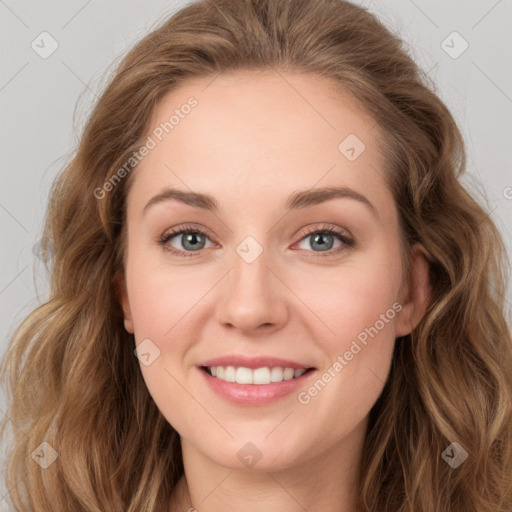 Joyful white young-adult female with long  brown hair and green eyes