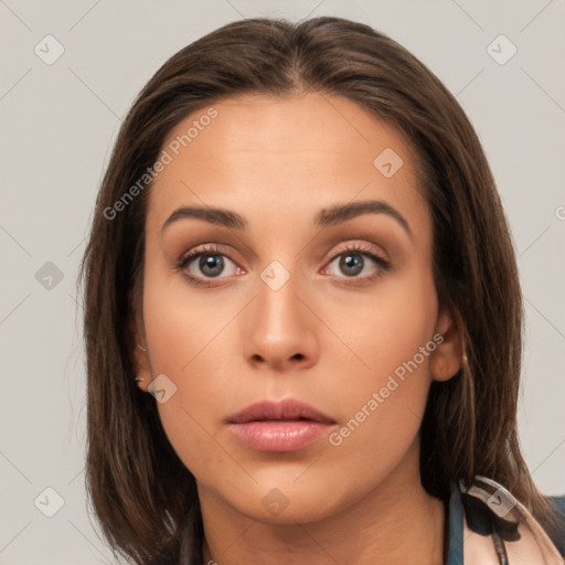 Neutral white young-adult female with long  brown hair and brown eyes