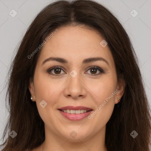 Joyful white young-adult female with long  brown hair and brown eyes