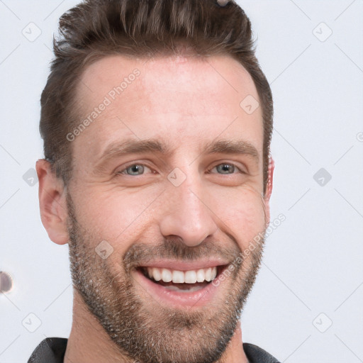 Joyful white adult male with short  brown hair and grey eyes