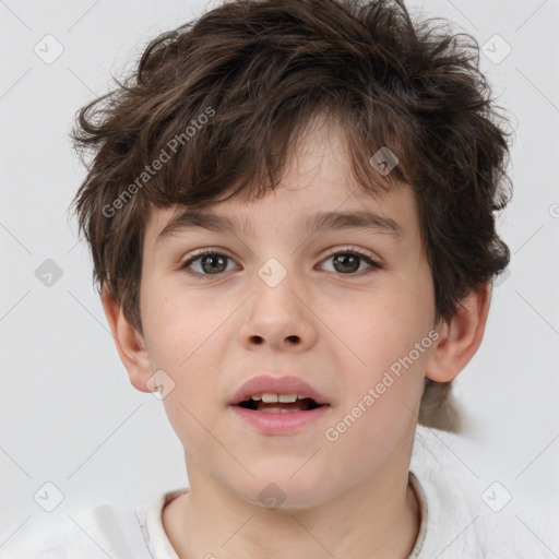 Joyful white child male with short  brown hair and brown eyes