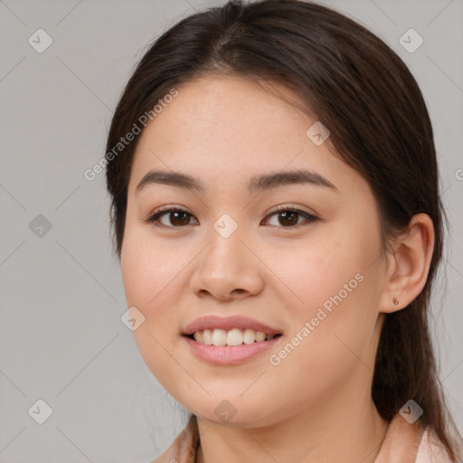 Joyful white young-adult female with long  brown hair and brown eyes