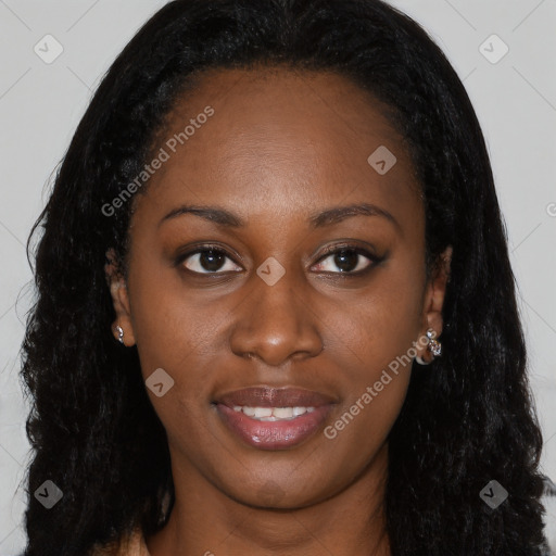 Joyful black young-adult female with long  brown hair and brown eyes