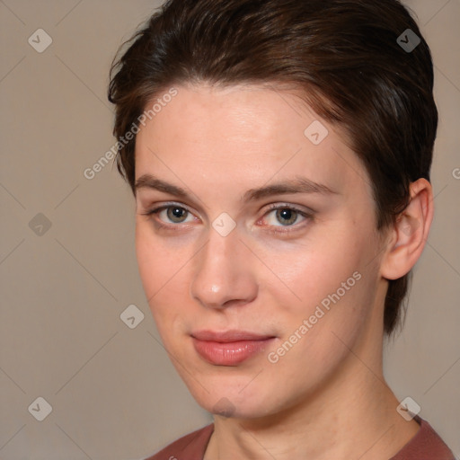 Joyful white young-adult female with medium  brown hair and brown eyes