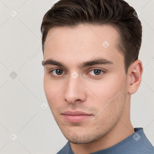 Neutral white young-adult male with short  brown hair and brown eyes