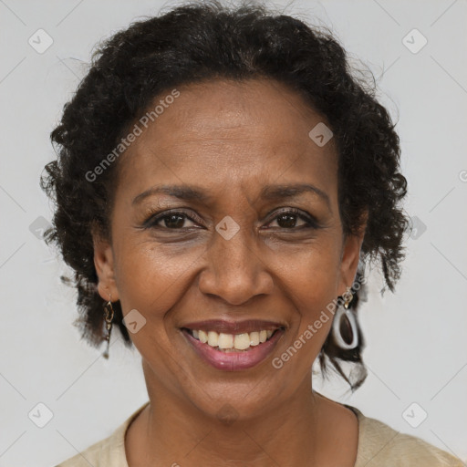 Joyful black adult female with short  brown hair and brown eyes