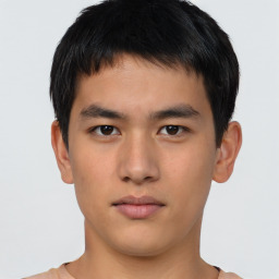 Neutral asian young-adult male with short  brown hair and brown eyes