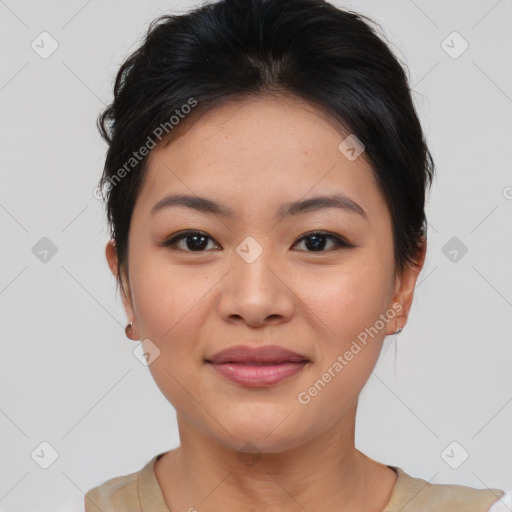 Joyful asian young-adult female with short  brown hair and brown eyes