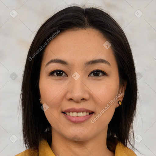 Joyful asian young-adult female with medium  brown hair and brown eyes