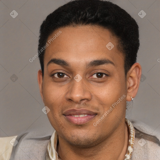 Joyful black young-adult male with short  black hair and brown eyes