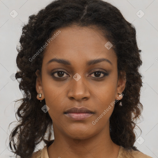 Neutral black young-adult female with long  brown hair and brown eyes